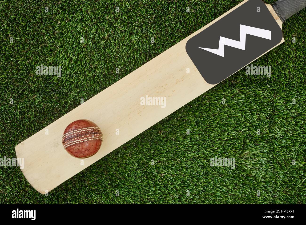 A studio photo of cricket gear on grass Stock Photo Alamy