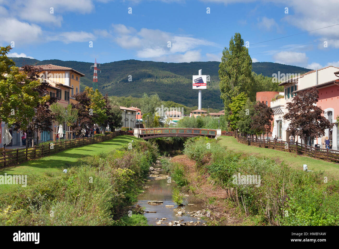 MUGELLO, ITALY - SEPTEMBER 11, 2014: People walk along McArthurGlen Designer Outlet Barberino situated in 30 minutes from Florence. McArthurGlen Group Stock Photo