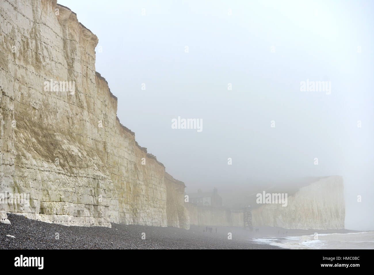 Chalk cliffs at Birling Gap, East Sussex, shrouded in sea mist Stock Photo