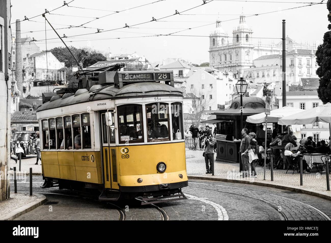 Classic vintage tram route 28 in Alfama district in Lisbon Portugal. Stock Photo