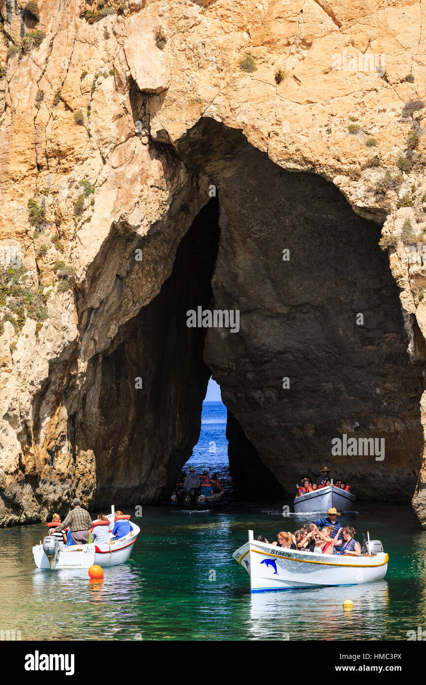 excursion boats travelling from the inland lagoon through the arch to ...