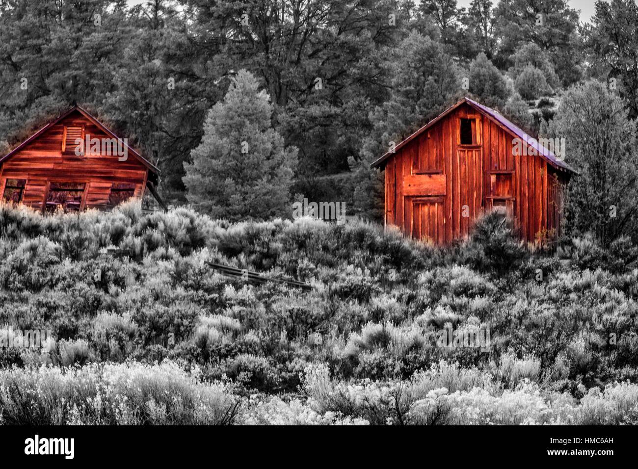 A couple of barns stand out at the landscape at Walker Pass, California. Stock Photo