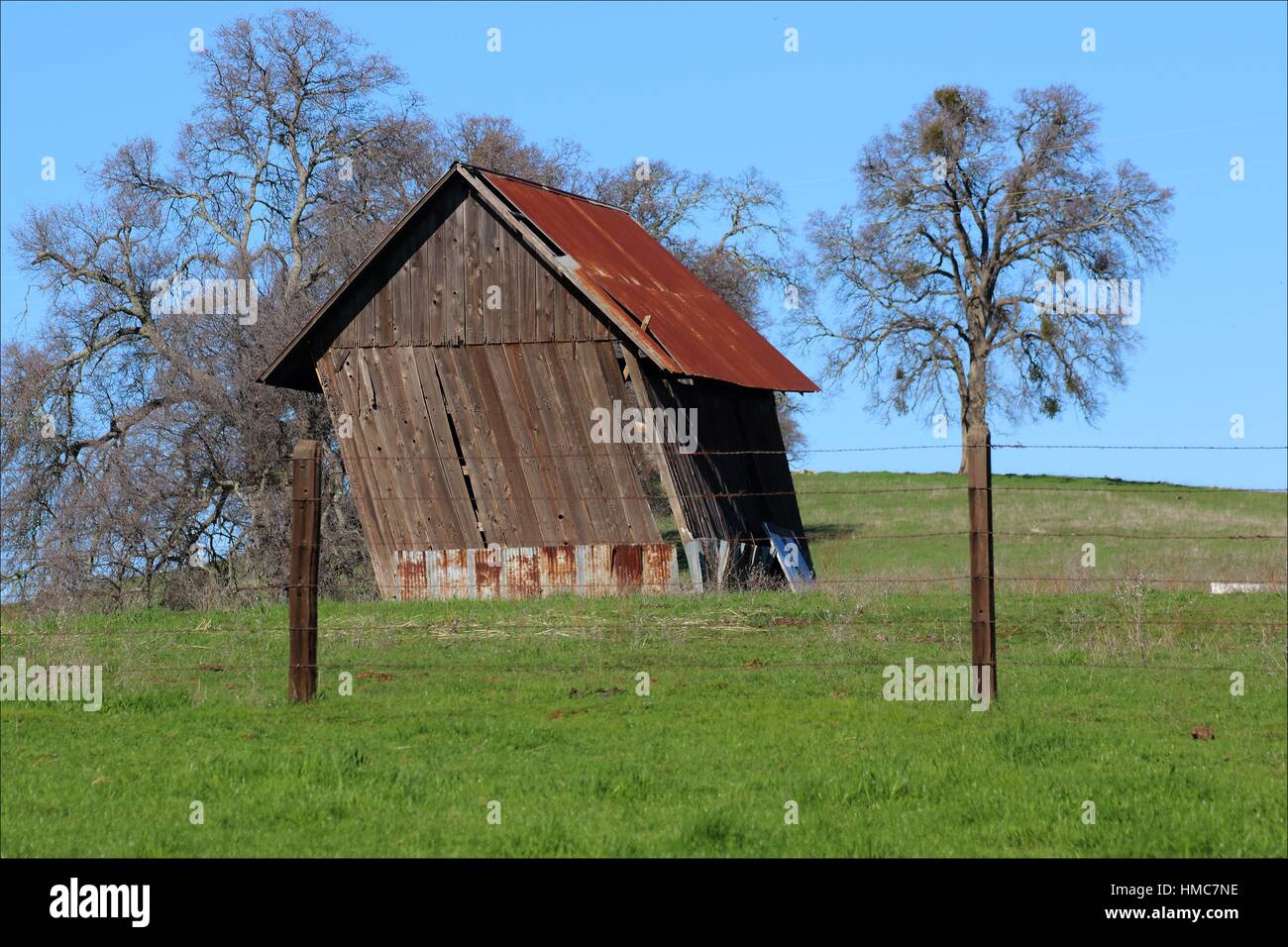 This old slanted wood barn sits near Latrobe, California, just waiting