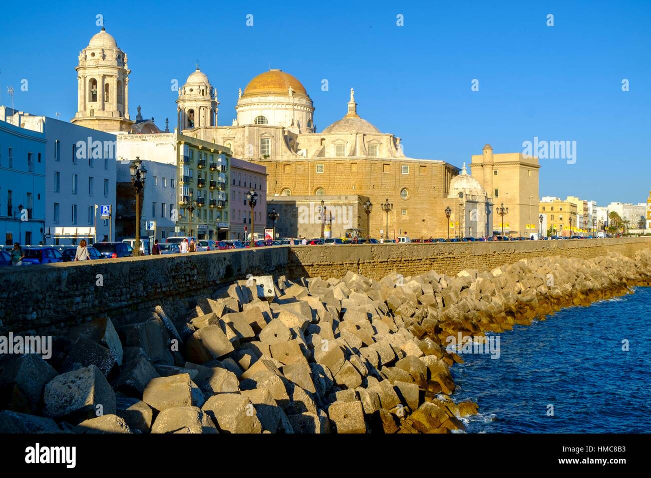 Cathedral and embankment in sunny day time. Cadiz, Spain. Stock Photo