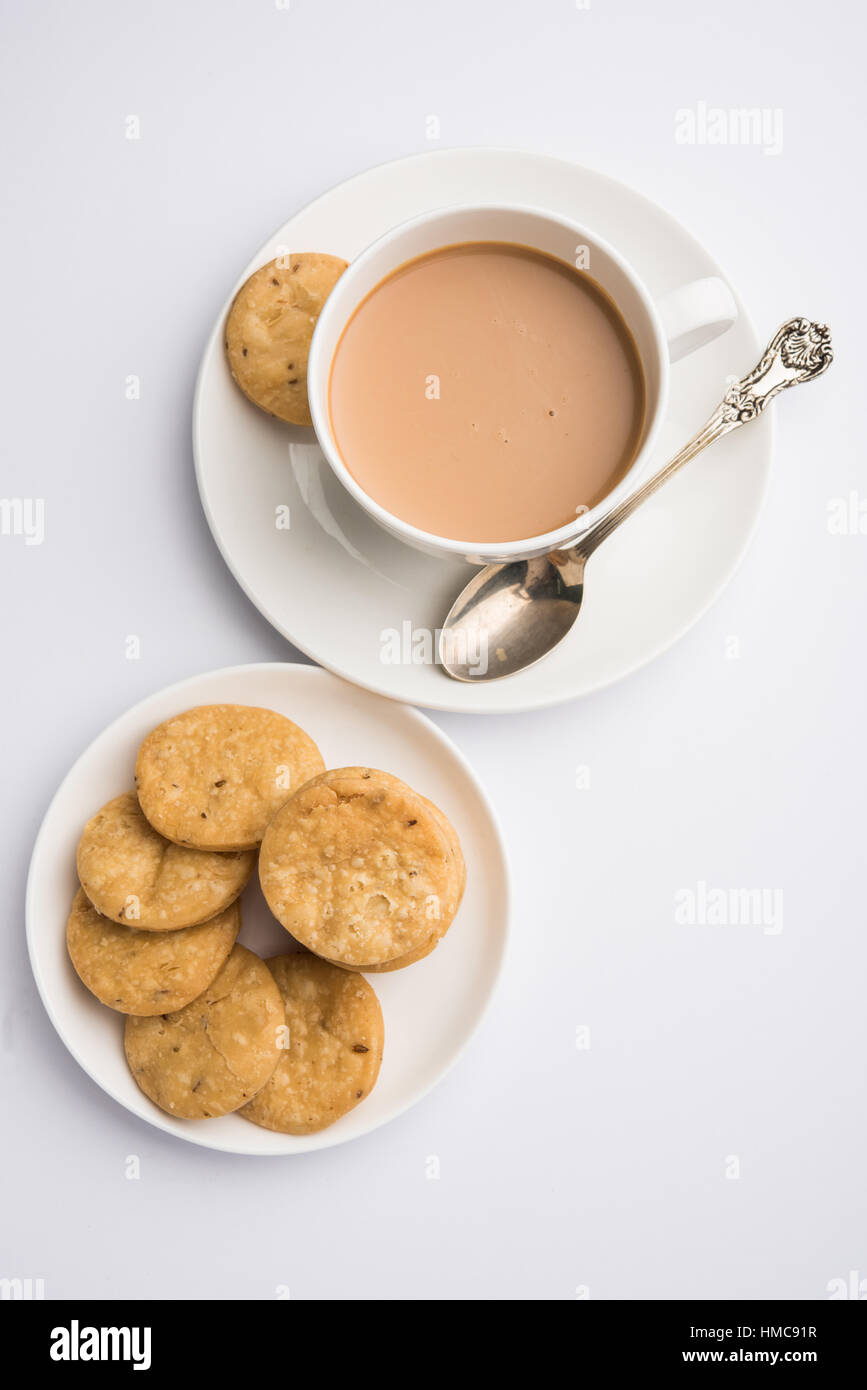 spicy fried mathri or mathari which is an indian snack served with a ...