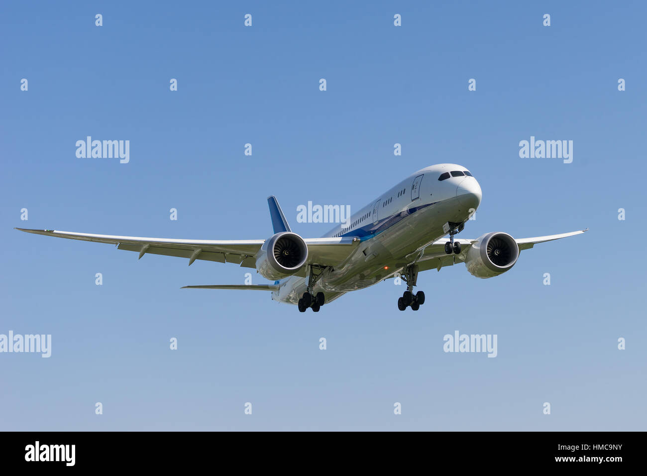 Boeing 787-8 landing to the airport. Stock Photo