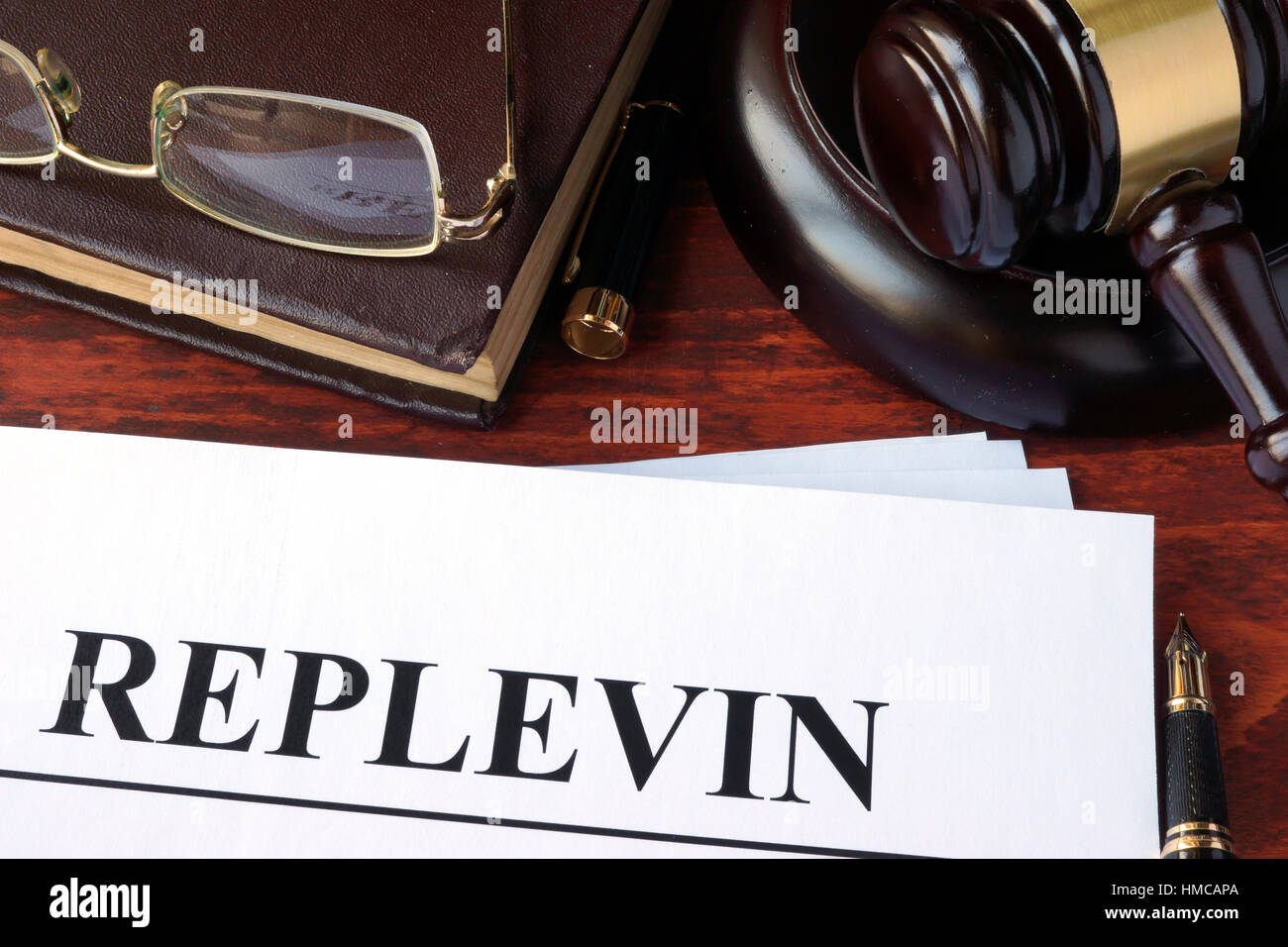Replevin, documents and gavel on a table. Stock Photo