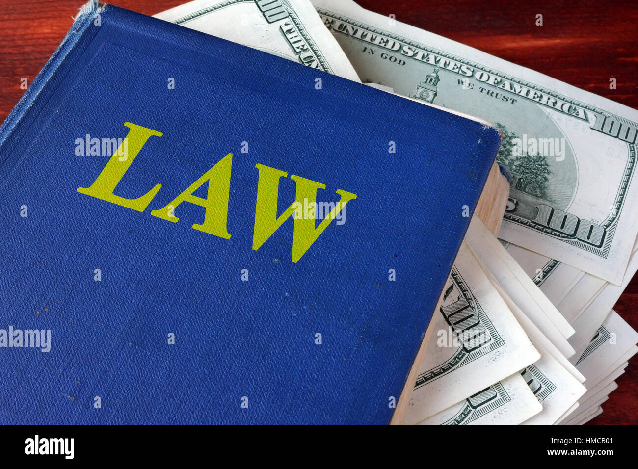 Political corruption concept.  Book with law and cash. Stock Photo