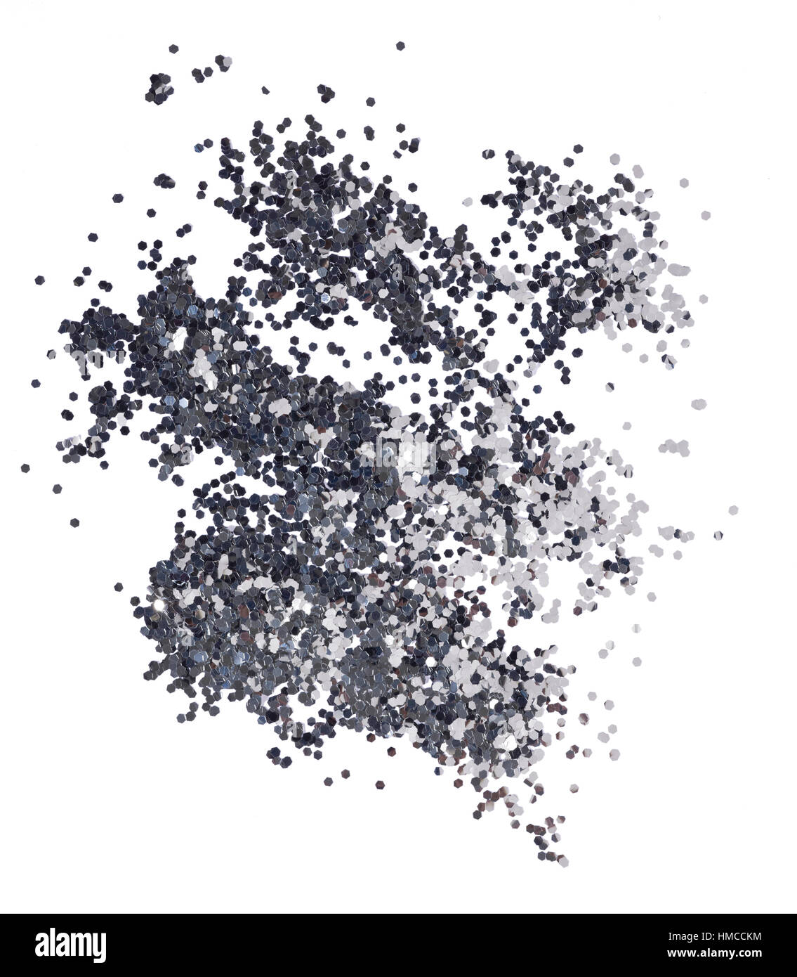 a cut out beauty image of a sample of scattered silver make up glitter Stock Photo