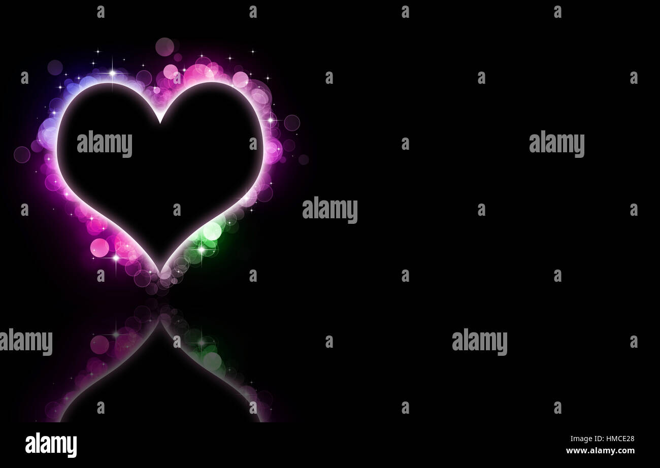 abstract multicolor bokeh heart on dark background Stock Photo