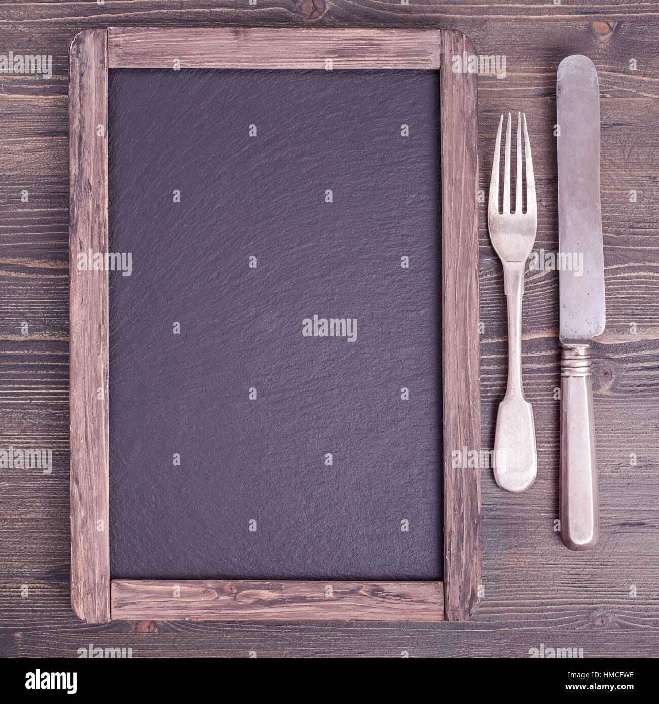 Menu blackboard with knife and fork Stock Photo Alamy