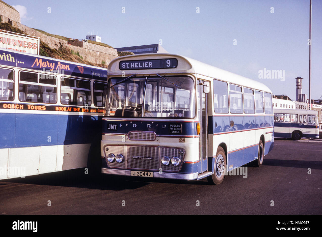 Jersey, Channel Islands - 1973: Vintage image of bus in St Helier, Jersey.  Jersey Motor Transport Ford 24 (registration J30447 Stock Photo - Alamy
