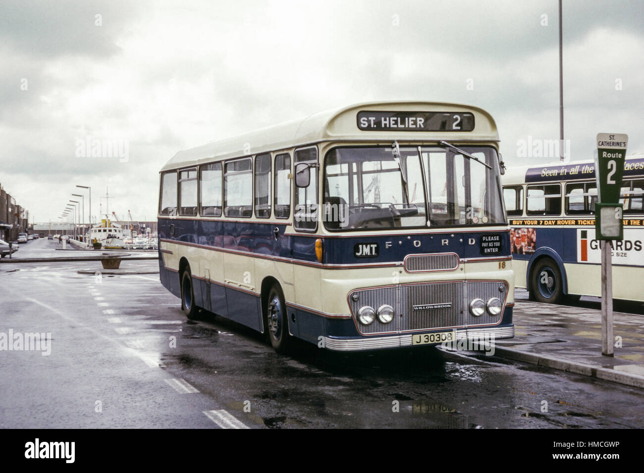 Jersey, Channel Islands - 1973: Vintage image of bus in St Helier, Jersey.  Jersey Motor Transport Ford R192 Willowbrook 18 (registration J30308 Stock  Photo - Alamy