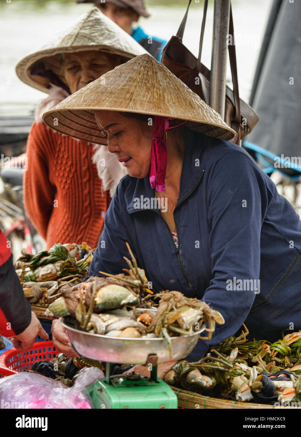 Crab vendor in the fish market, Hoi An, Vietnam Stock Photo Alamy