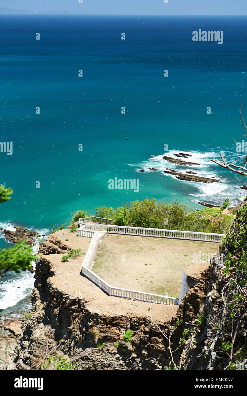 terrace with white fence on blue ocean background Stock Photo