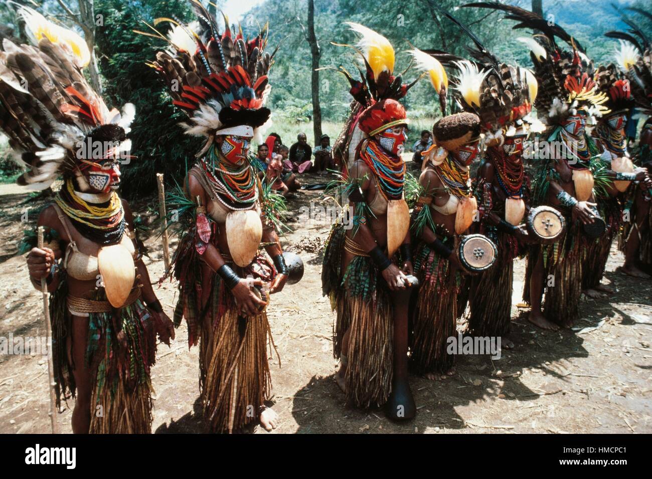 Women dressing up for a sacred dance (Sing-sing), Papua New Guinea. Stock Photo