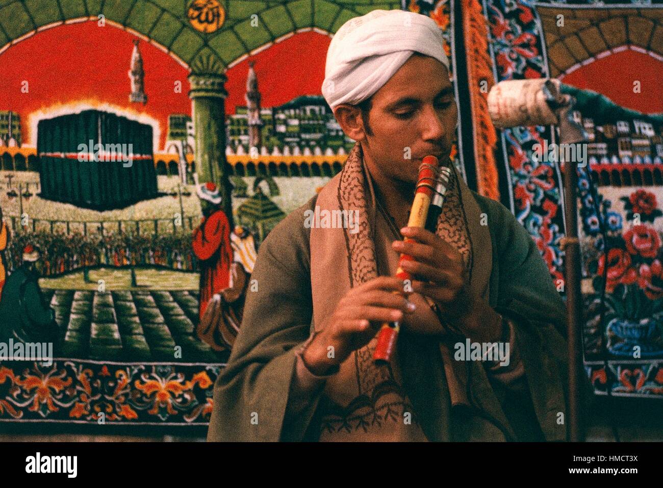 Flute player during Mawlid alNabi, Islamic celebration of the Prophet