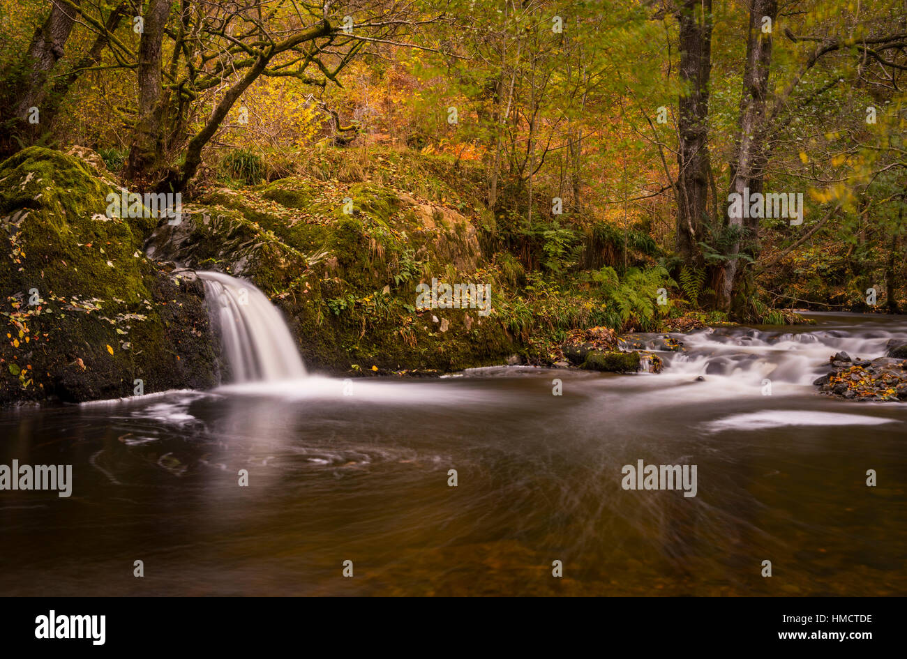 Waterfall in autumn, English Lake District Stock Photo