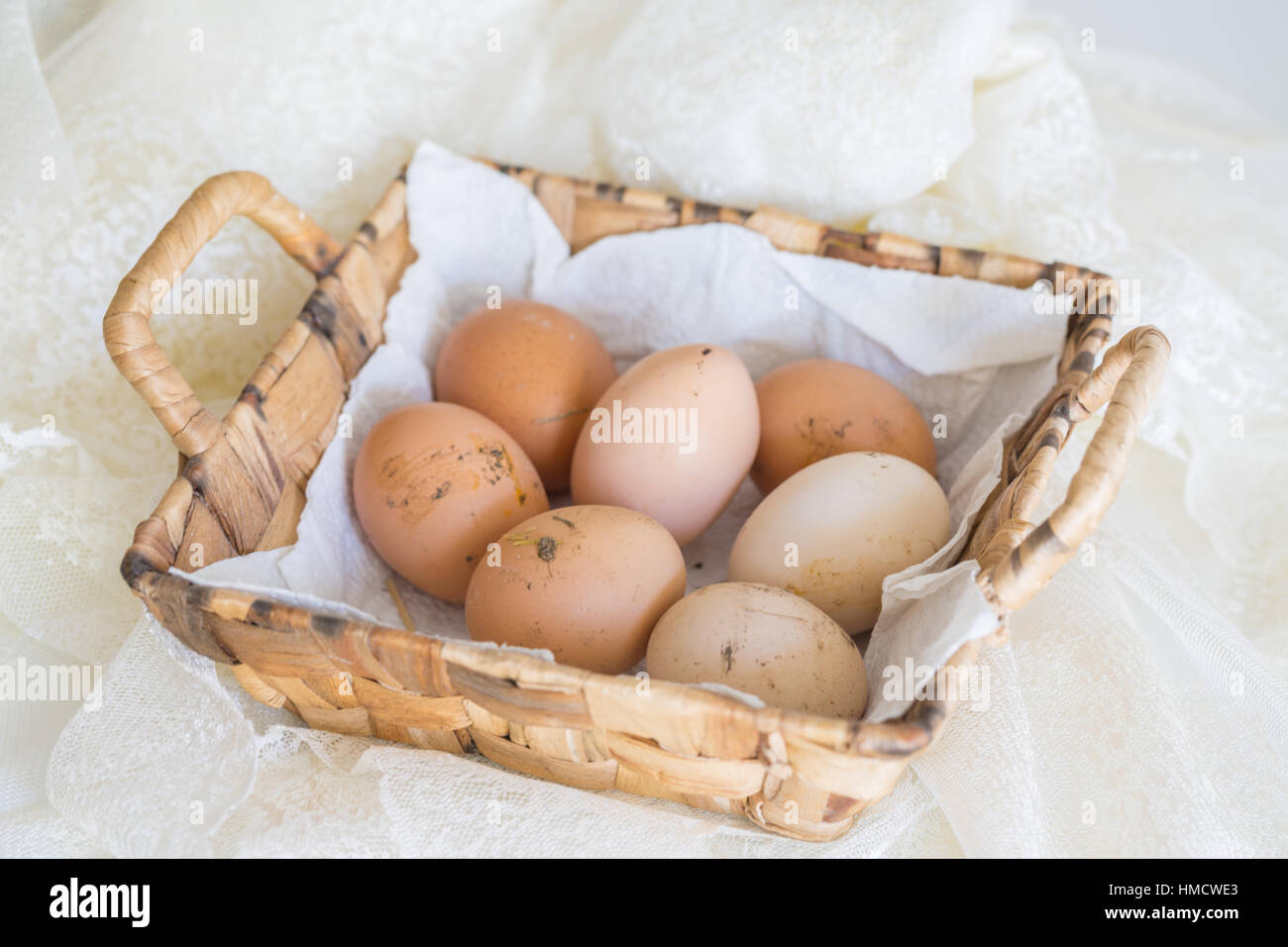Natural hen eggs in basket Stock Photo Alamy