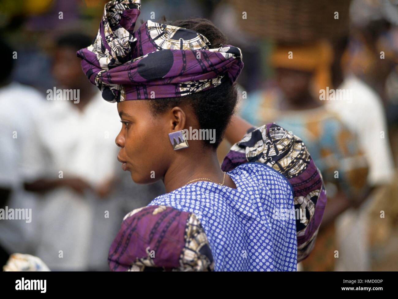 Young woman in traditional dress at the Kumasi market, the largest in Africa, Ghana. Stock Photo