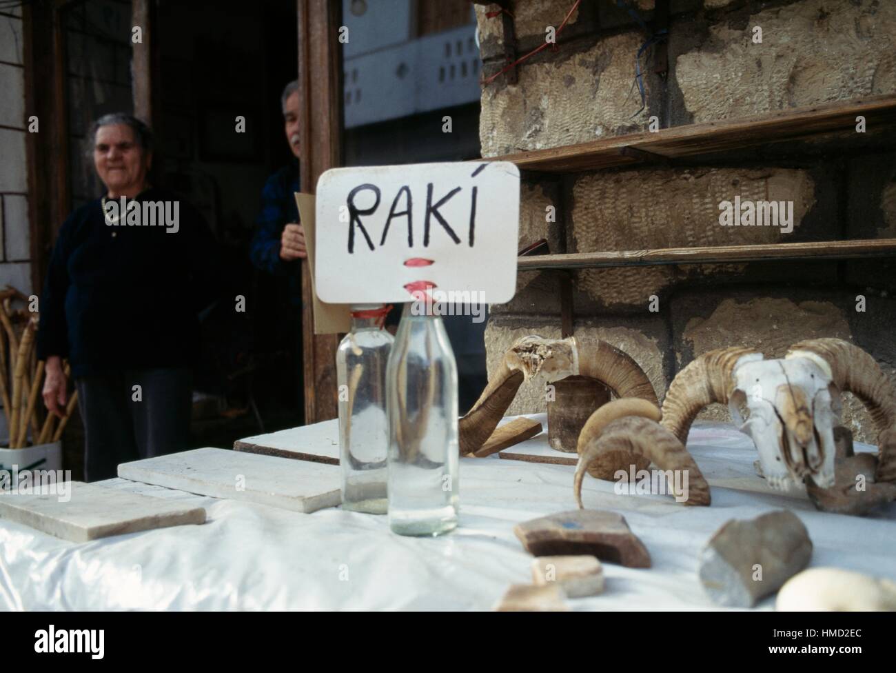 Raki for sale, anise and mint flavoured brandy, Axos, Crete, Greece. Stock Photo