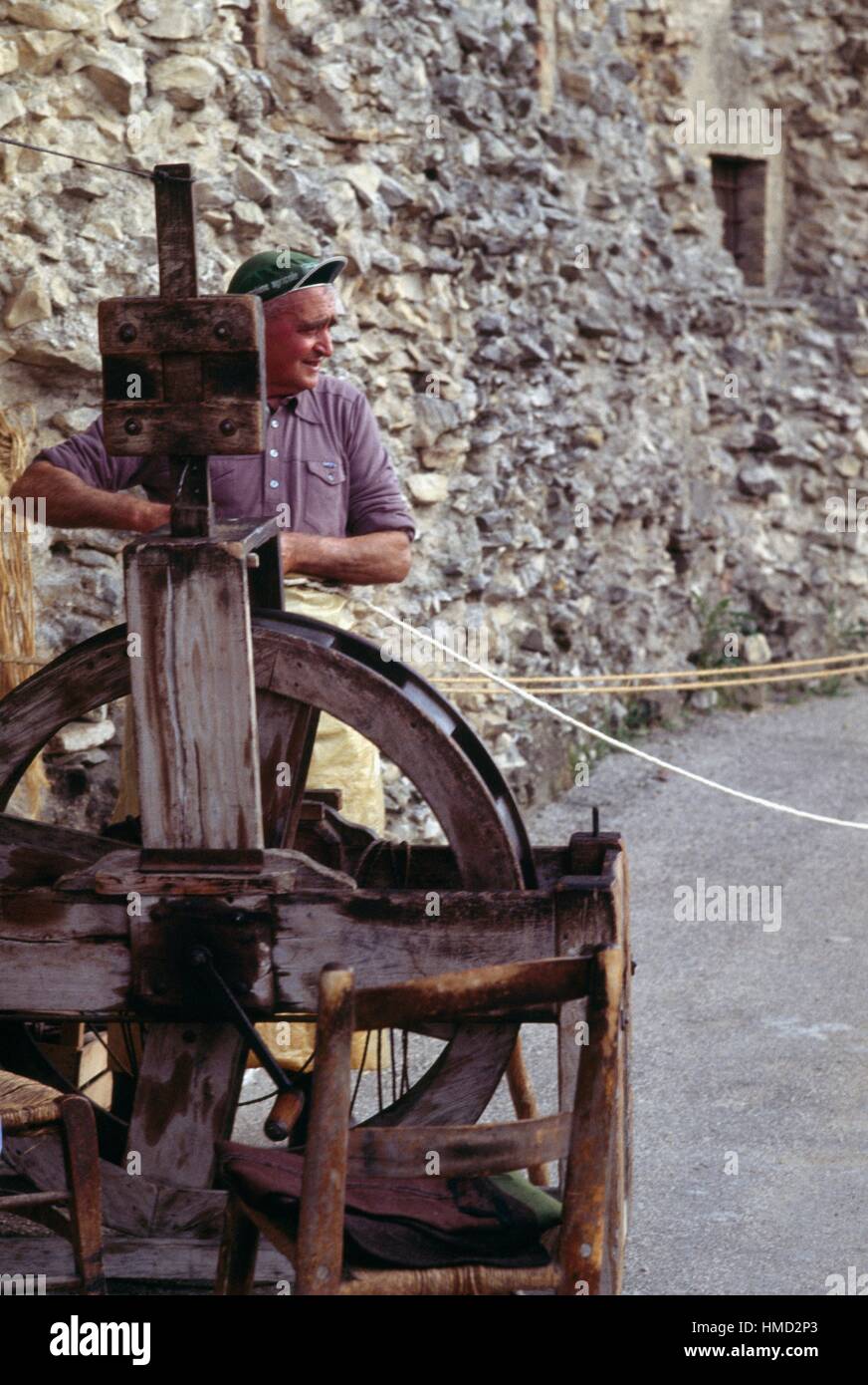 A ropemaker with a rope-making machine, Bevagna, Umbria, Italy