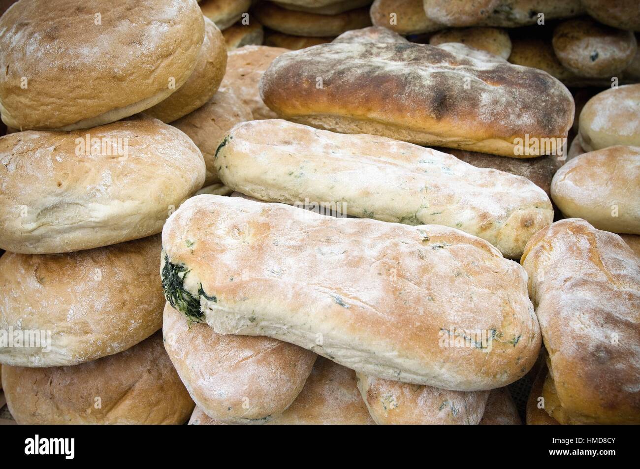 different types of bread in a bakery. Chapatas, Wholemeal bread, Organic, Seeded, Granary bread