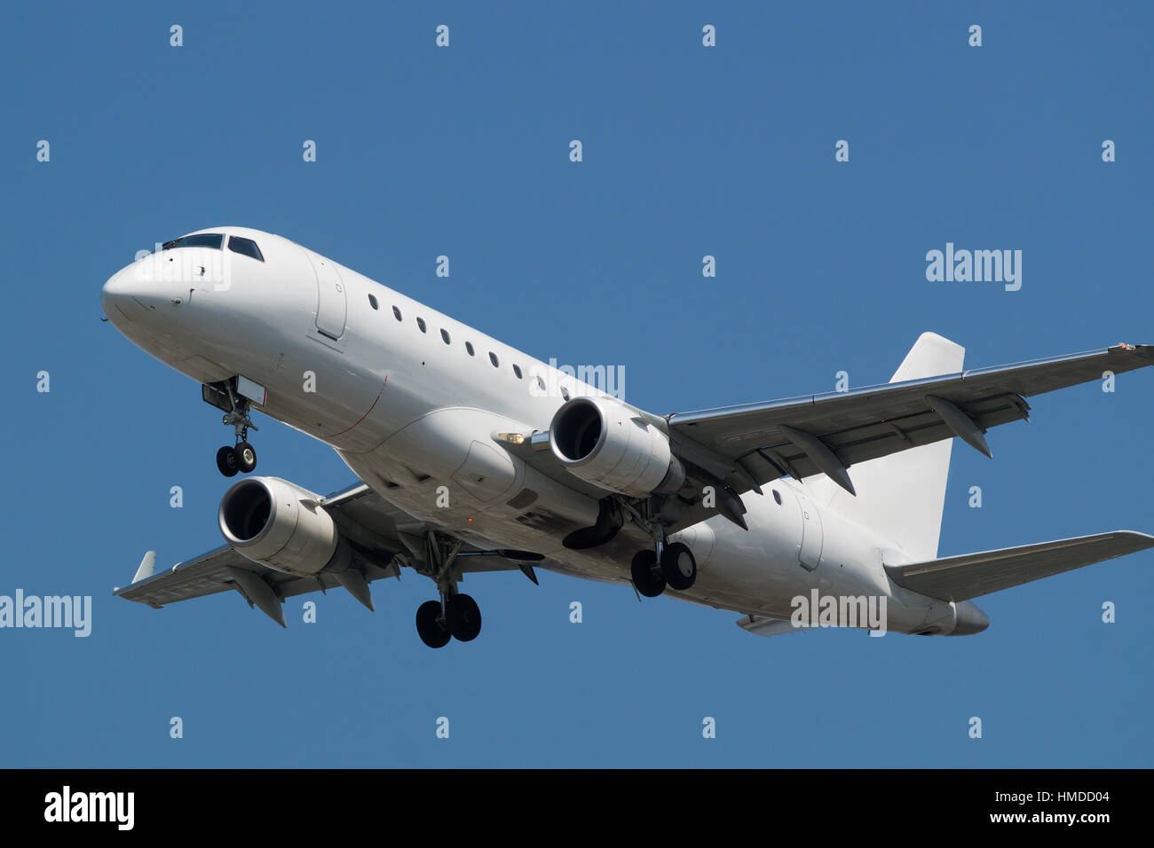 Airplane landing to the airport. Stock Photo