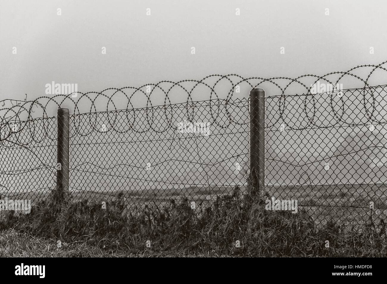 Razor wire and barbed wire means “stay out!” Cape Town, South Africa