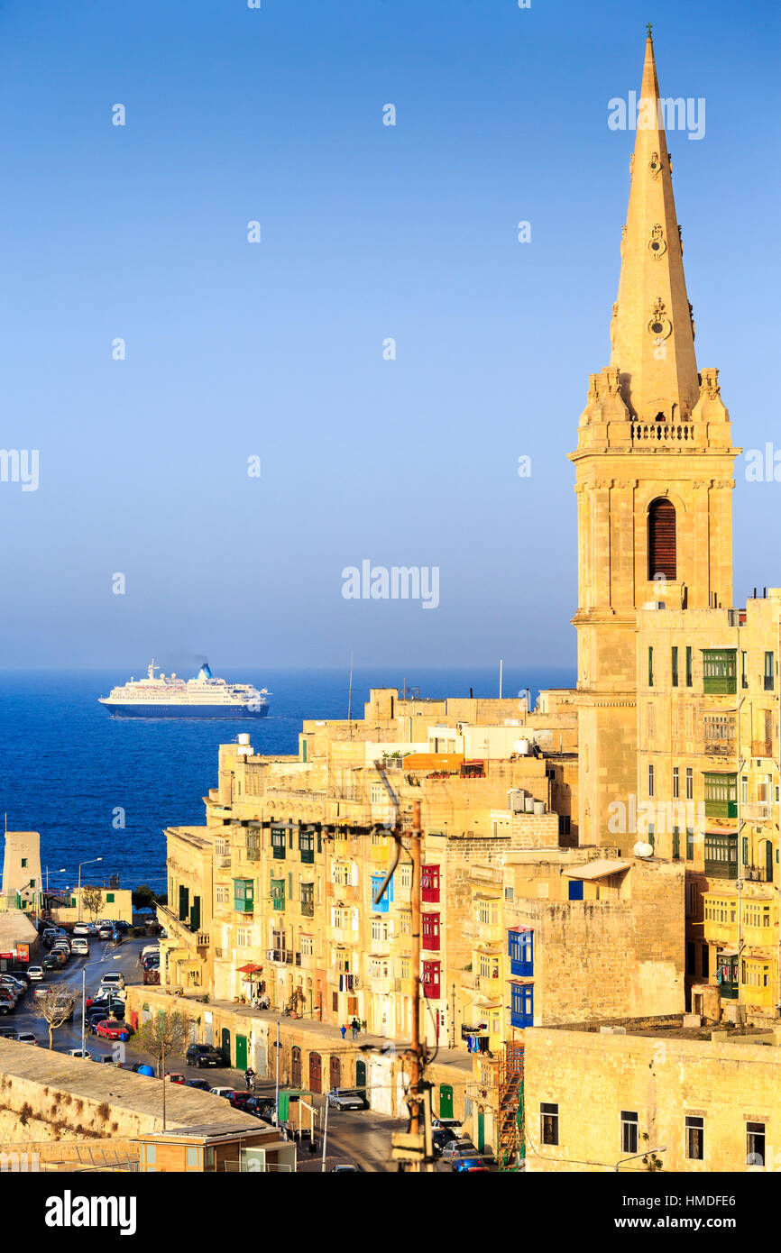 St Pauls Anglican Cathedral, valletta, malta with cruise ship in background Stock Photo