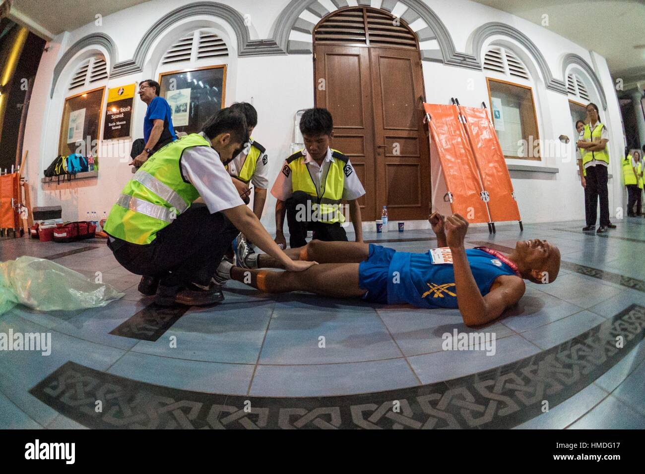 First aid on marathon runner after legs cramped in Kuching, Sarawak
