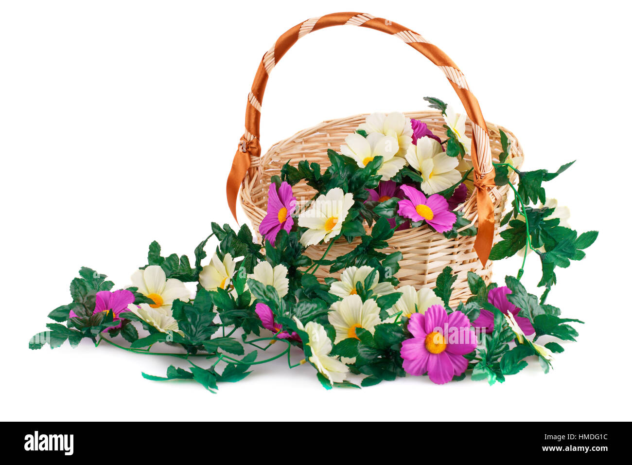Fabric flowers in wicker basket isolated on white background Stock ...