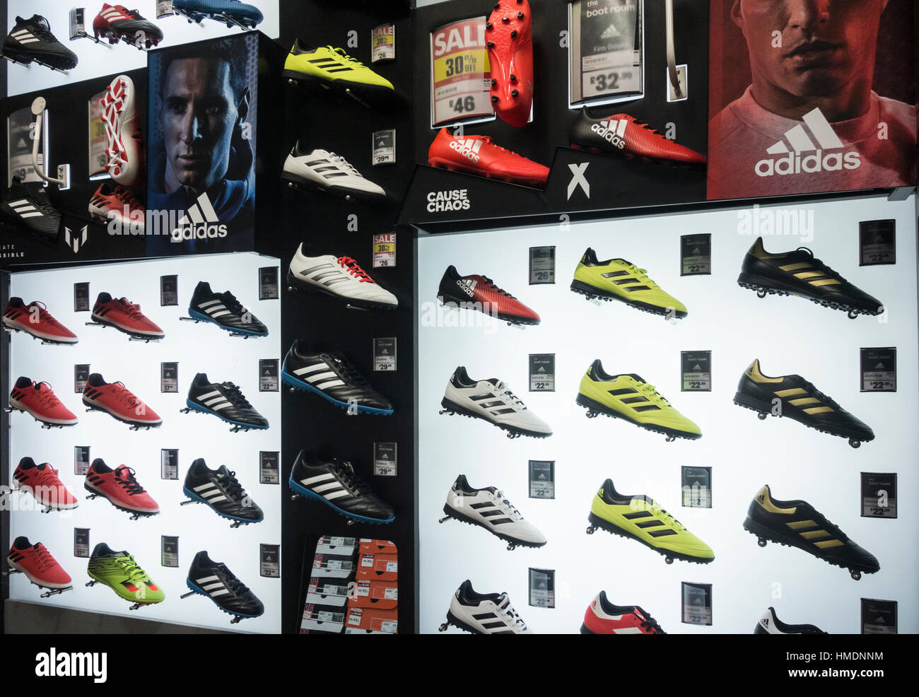 Adidas football boots in UK store Stock Photo - Alamy
