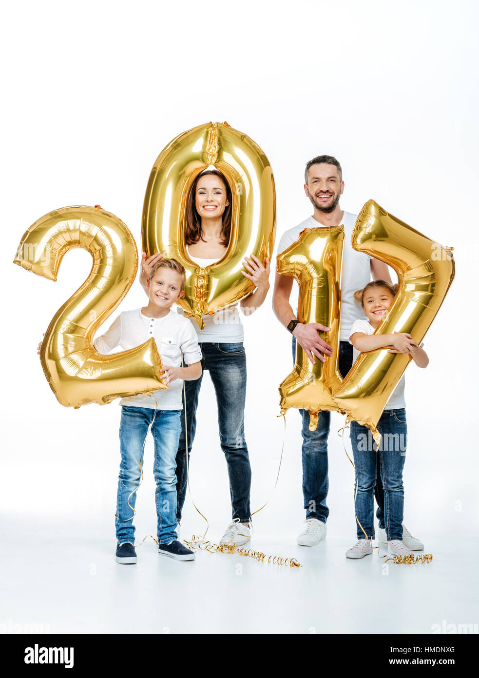 Family with color balloons hi-res stock photography and images - Alamy