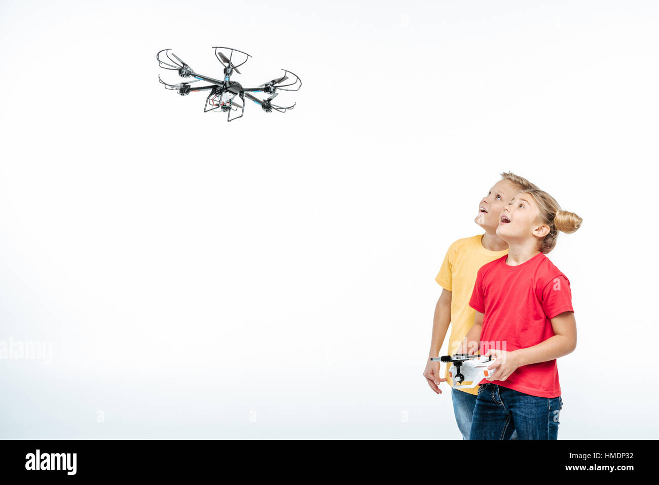 kids playing with hexacopter drone Stock Photo