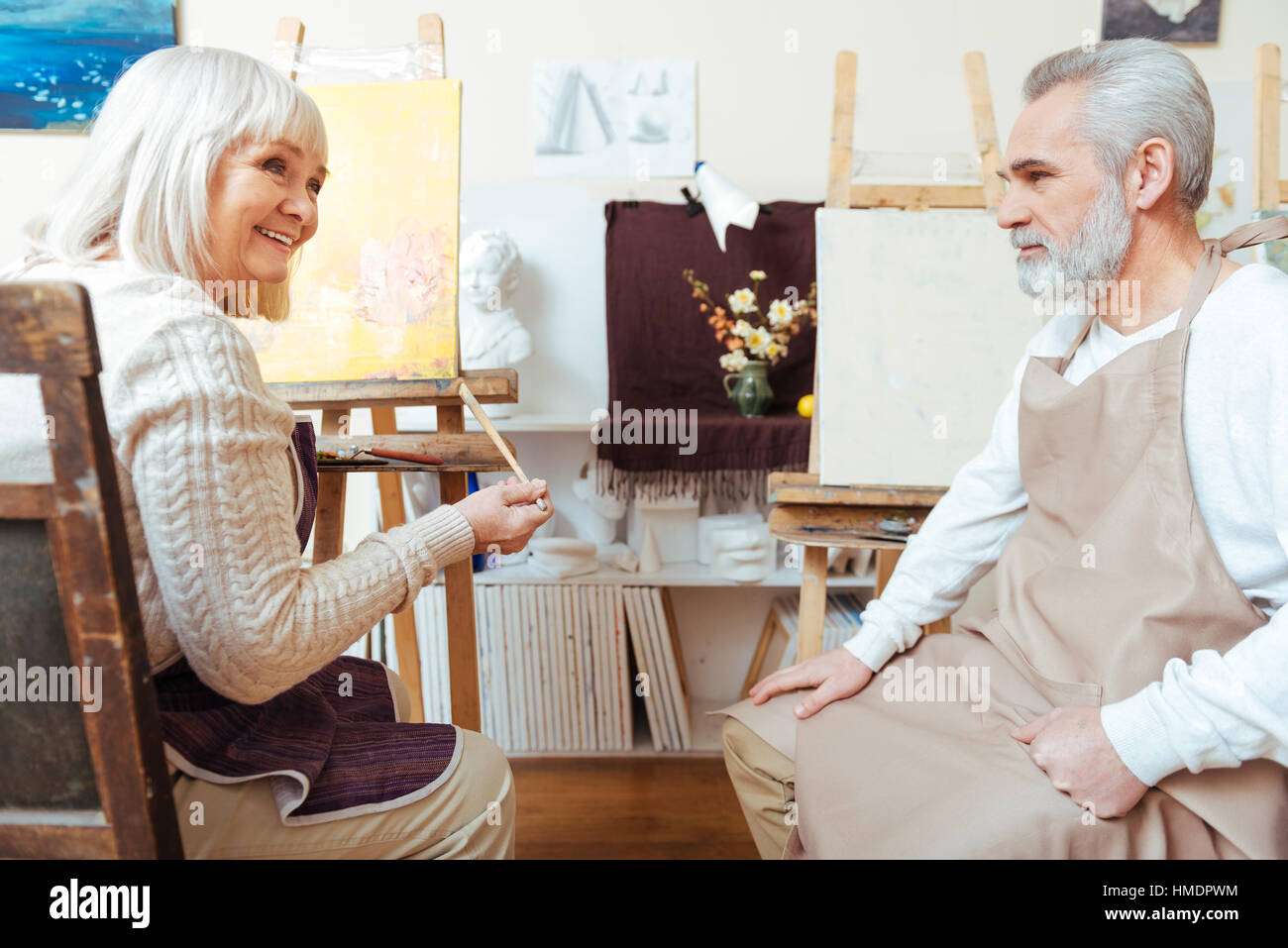 Male and female artists painting together Stock Photo - Alamy