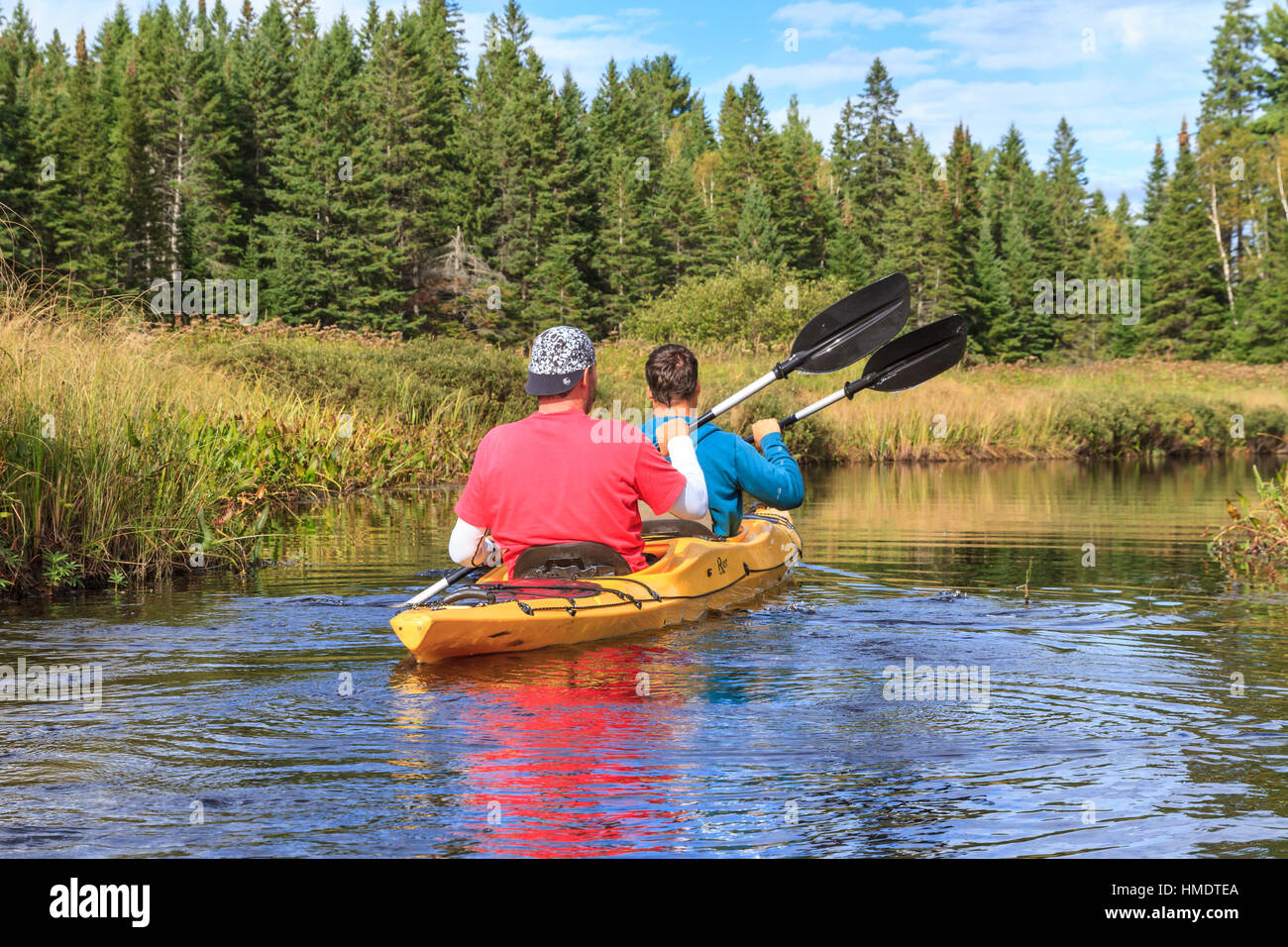 Two men paddling in a kayak, Madawaska River, Algonquin Provincial Park, Ontario Province, Canada Stock Photo