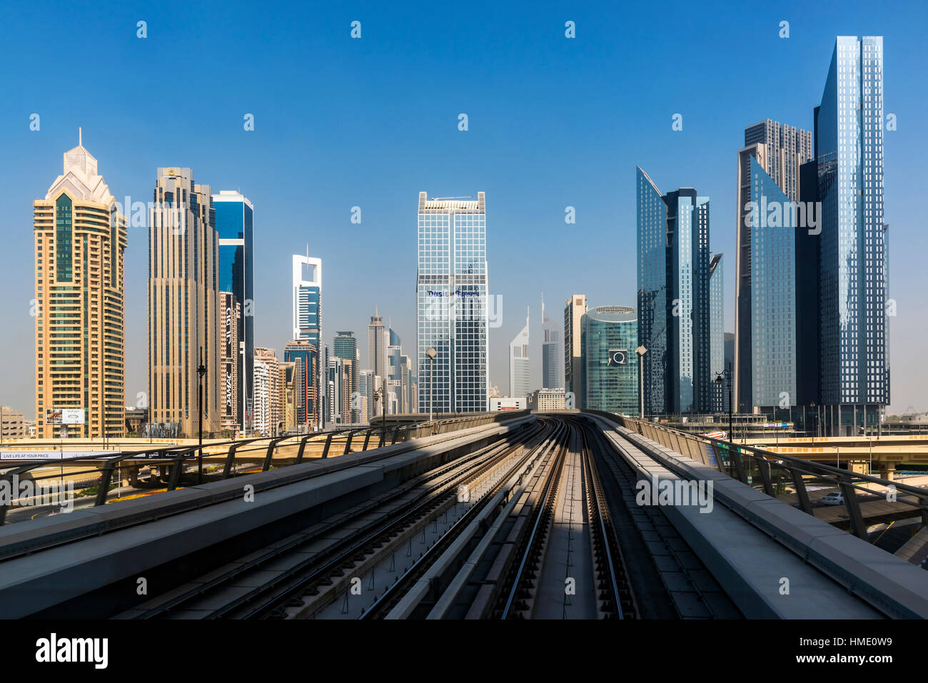 Downtown skyline as seen from the metro train, Dubai, United Arab Emirates Stock Photo