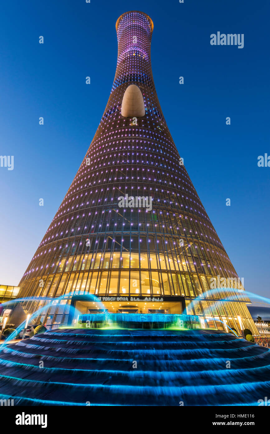 Low angle view of Aspire Tower, also known as The Torch Doha, Doha, Qatar Stock Photo