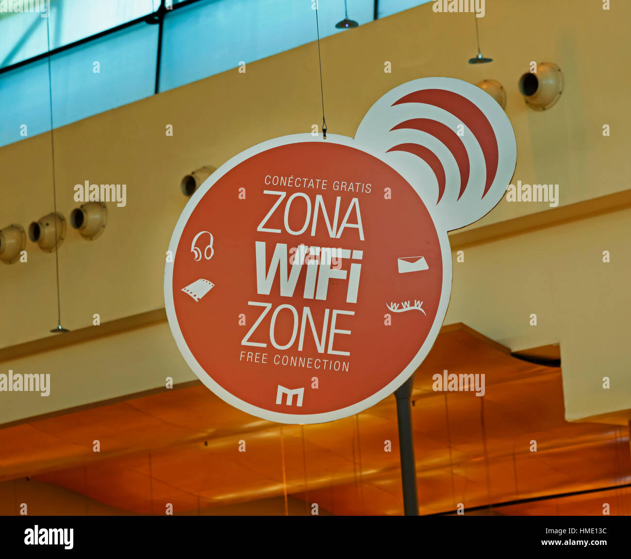 Free WiFi zone in Miramar Shopping Centre.  Bilingual sign in Spanish and English. Fuengirola, Costa del Sol, Malaga Province, Andalusia, southern Spa Stock Photo