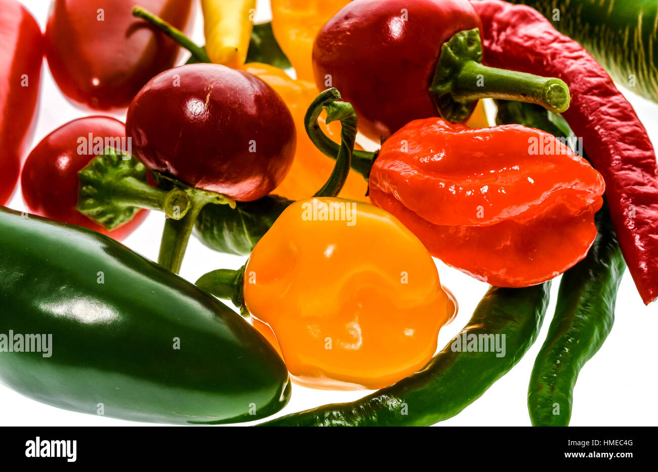 Different variety of hot peppers - a bunch of chilies, isolated on