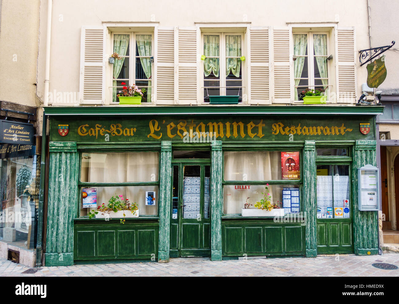 CHARTRES, FRANCE - CIRCA DECEMBER 2016: Facade of l'Estaminet, cafe-bar and restaurant in Chartres historical centre. Stock Photo