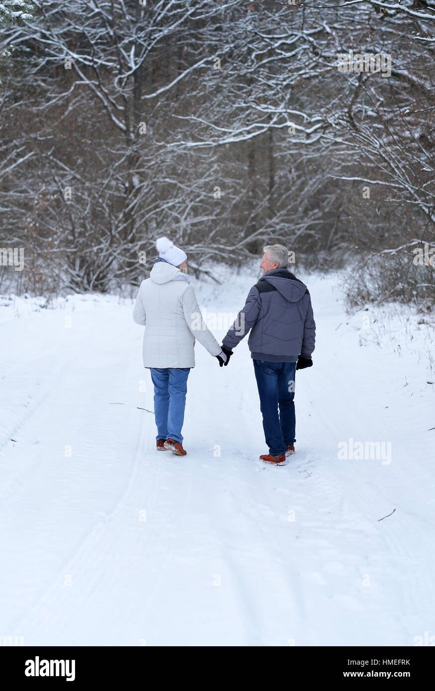 senior couple walking in the forest Stock Photo - Alamy