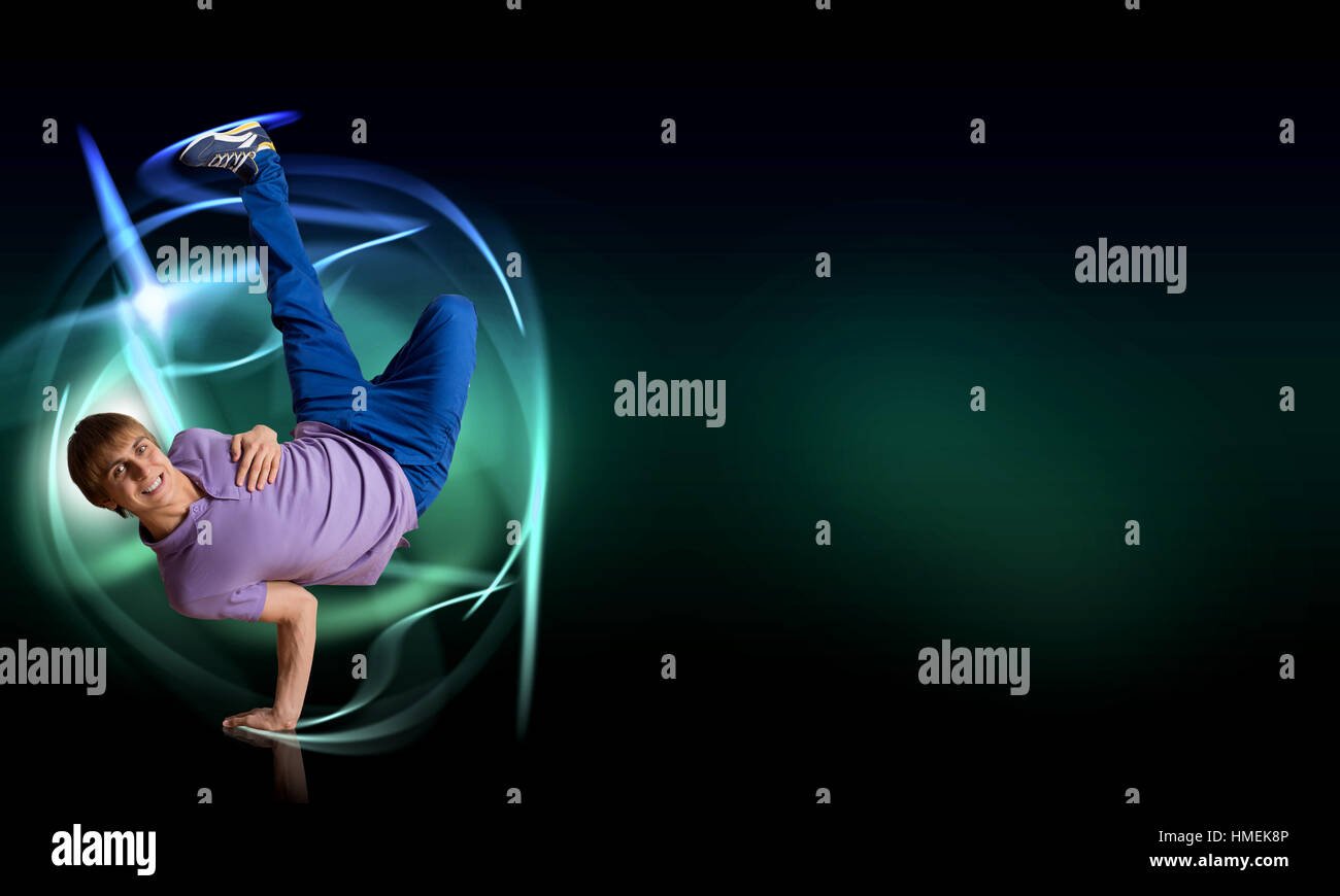 Breakdancer standing on hand Stock Photo - Alamy