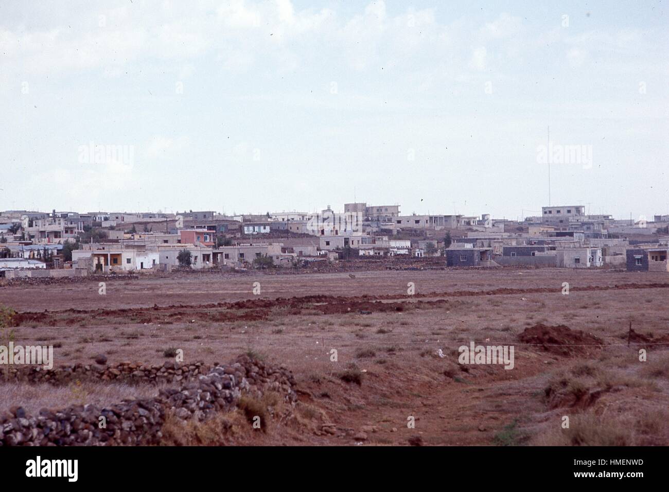 View from a distance facing south, showing the buildings and structures of the town of Quneitra, Syria, on the border with Israel in the Golan Heights, Israel, November, 1967. Stock Photo