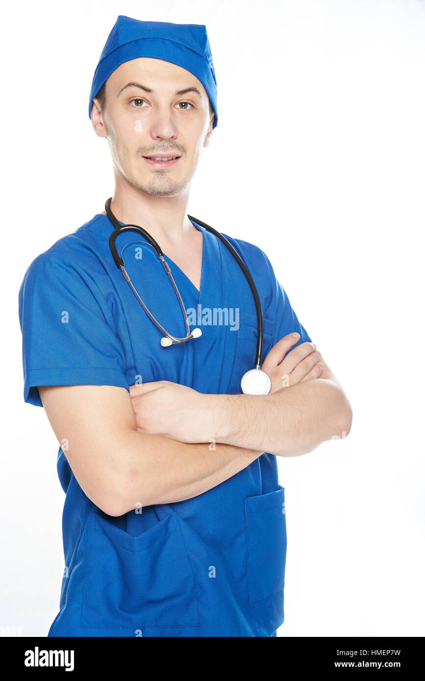young man doctor with crossed hands isolated on white Stock Photo