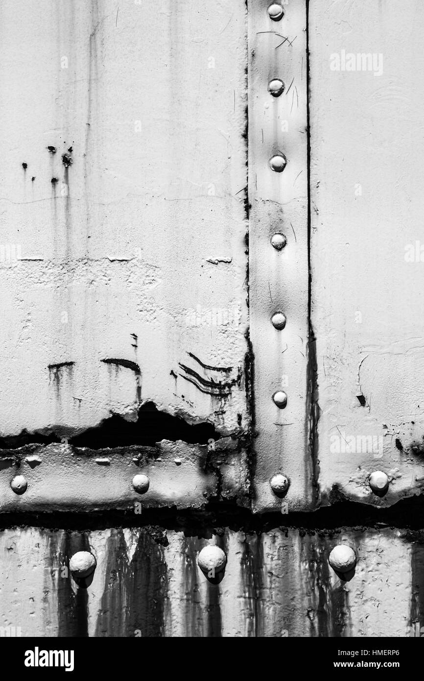 White industrial metal texture with rust and rivets Stock Photo
