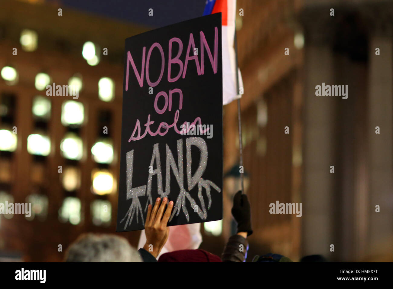 New York, United States. 01st Feb, 2017. Protesters holds a sign, 'No Ban on Stolen Land' at a No Ban No Wall rally for Muslims and Allies in Foley Square outside the Jacob K. Javits Federal Building. Credit: Robert K. Chin Credit: Robert K. Chin/Pacific Press/Alamy Live News Stock Photo