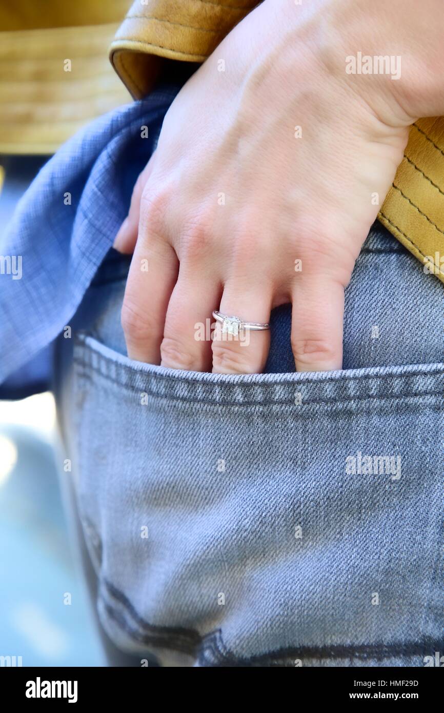 Engagement ring close up on hand in guys pocket Stock Photo Alamy