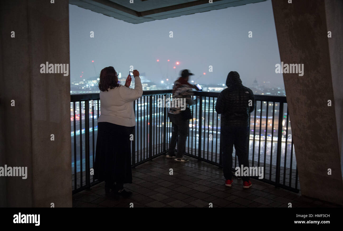 Photographers take photos from the balcony of the Tate Modern Switch House in London Stock Photo